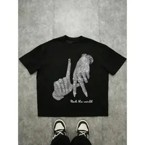 Unisex Boxy Fit Heavyweight TeeMen's Rock The World gesture graphic T-shirt, shiny rhinestone print hip-hop T-shirt, casual streetwear top, summer casual fashion top, loose fit cropped T-shirt, street trenOrganic Cotton Boxy Fit Oversized Dropped Shoulder
