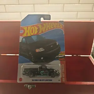 Hot Wheels 2009 Ford F-150 SVT Lightning Diecast Toy Car - Black Pickup with Custom Decal