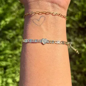 Lovely Bracelet - Simple Design with Heart Charm and Chain Details as Seen in the Image