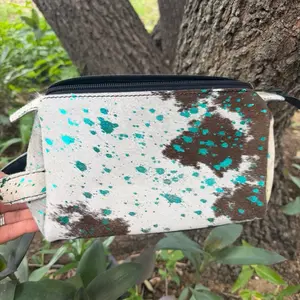 Cowhide and turquoise leather toiletry bag