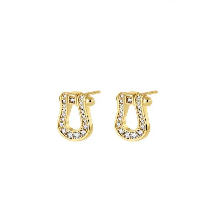 Gold horseshoe buckle earrings