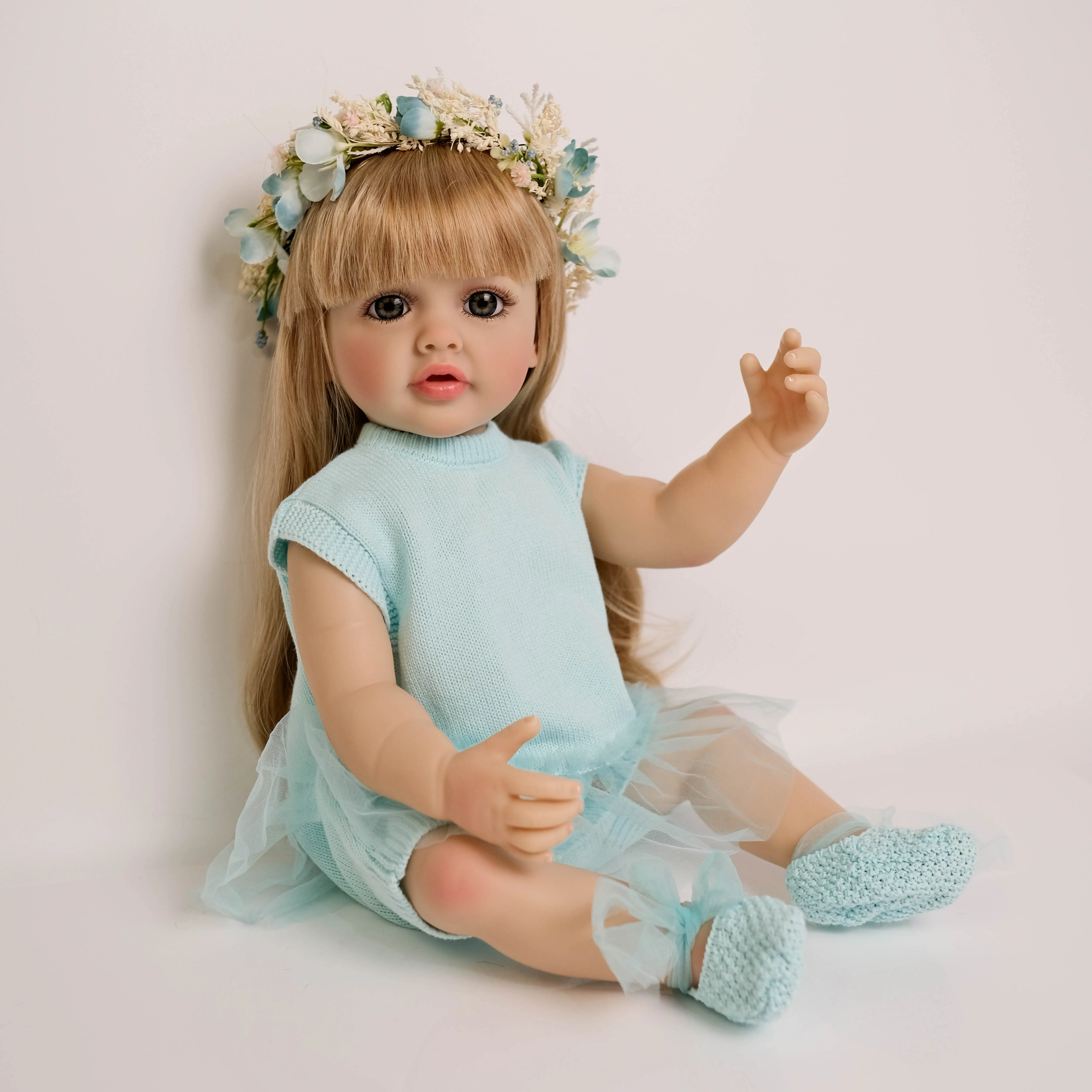 22-in Realistic Silicone Vinyl Reborn Dress Up Girl Doll, Betty, Full Body with Blonde Wig, Sparkling Blue Eyes, Sky Blue Knit Dress, Poseable Arms, Water-Friendly Design, Complete Outfit Set, Dress Up Doll Figure Dolls
