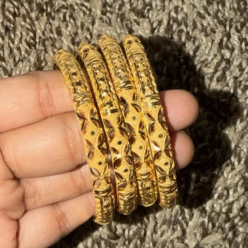 22k Gold Plated Bangles 4 Pieces Set with Intricate Designs for Indian Ensembles Elegant 22 Karat Gold Plating Versatile Jewelry