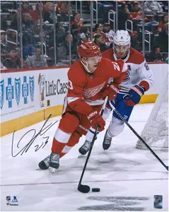 Lucas Raymond Detroit Red Wings Autographed 16" x 20" Red Jersey with Puck Photograph - Fanatics Authentic Certified