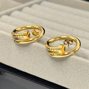 Elegant Nail Design Earring - Gold-Toned Fashion Accessory for Stylish Looks