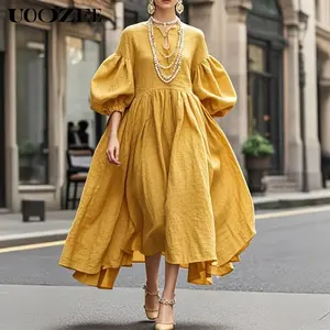 UOOZEE Retro Style Solid Color Dress with Fashionable Round Neck Bubble Sleeve Waist, Irregular Skirt Design, Fashionable Wear on Medium to Long Skirts