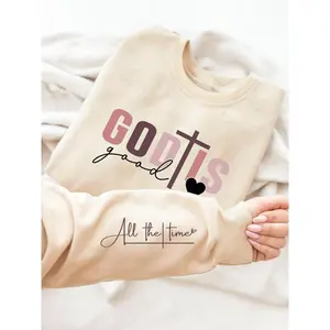 Women’s crewneck sweatshirt with a cross-shaped heart print, casual long-sleeve pullover, women’s summer outfit GARMENTARY