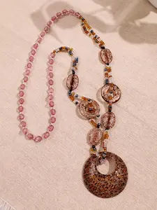 One Bohemian-style necklace for women featuring a round leopard print and sparkling beads; unique design—perfect for everyday wear, holidays, and parties; jewelry gift.
