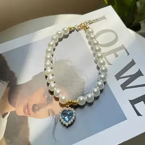 Elegant Adjustable Vintage Pearl Pet Necklace with Golden Heart Pendant and Bowknot Charm - Ideal for Dogs and Cats, Perfect Wedding Accessory, Holiday Gift, Fashionable White Pearl Design for Special Occasions, Dog Necklace