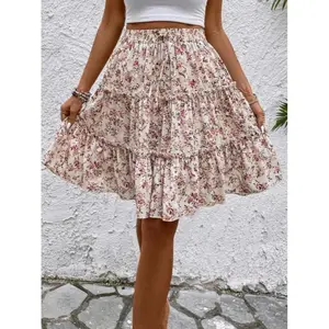 Women's floral print layered hem skirt, a fashionable casual skirt suitable for daily vacation wear, summer women's underwearRAIMENTRY