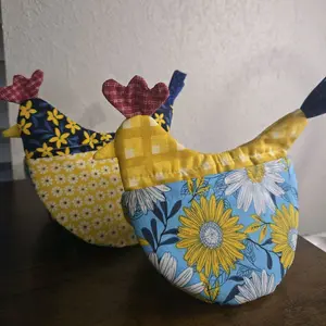 yellow and blue chicken potholders