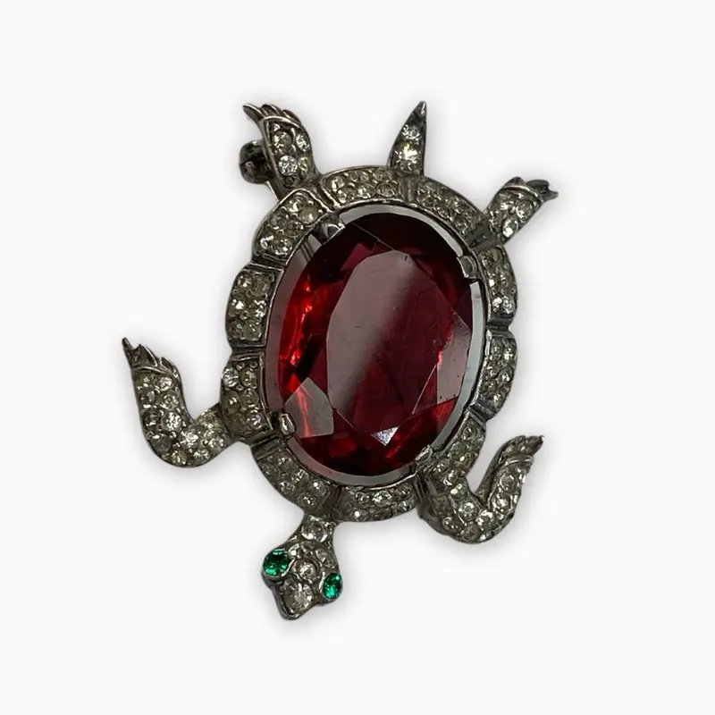 Crown Trifari Turtle Brooch with Red Gemstone and Green Accents Classic Design Jewelry Piece