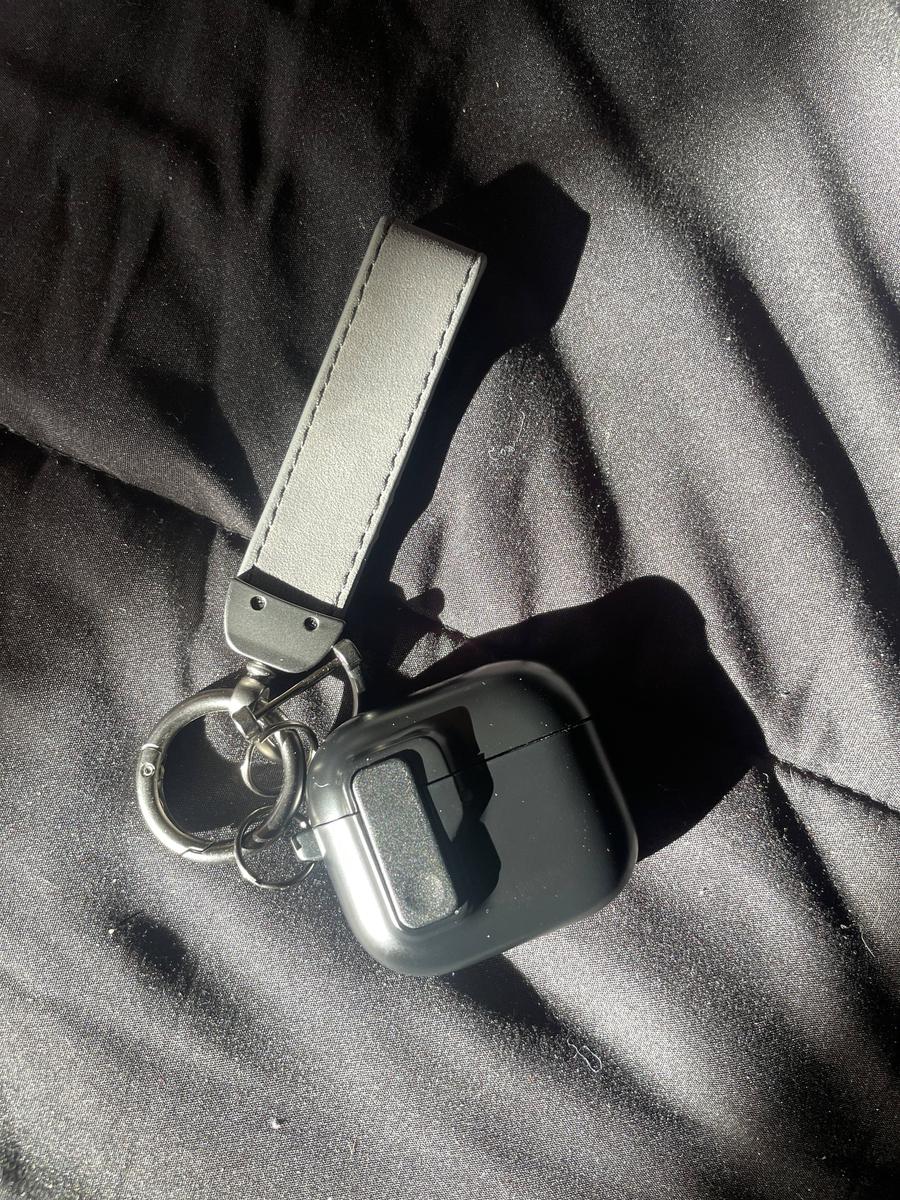 Item: Glossy Black + Suede Strap, airpods 4