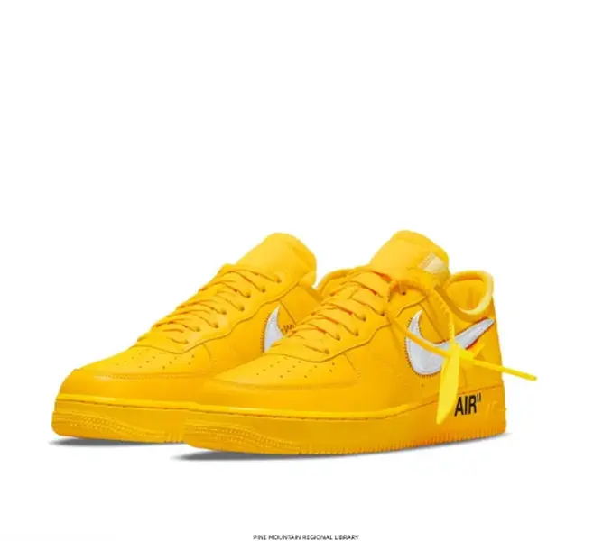 ##  Bright‑Yellow Monochrome Low‑Top Retro Sneakers, full‑yellow leather upper, white side logo detail, matching yellow laces and outsole. Vibrant solid‑tone street‑style shoes for casual daily wear.