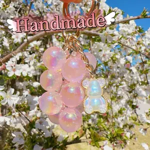 Handmade Gifts High-quality, beautiful little bear, pink bead grape cluster acrylic keychain.
