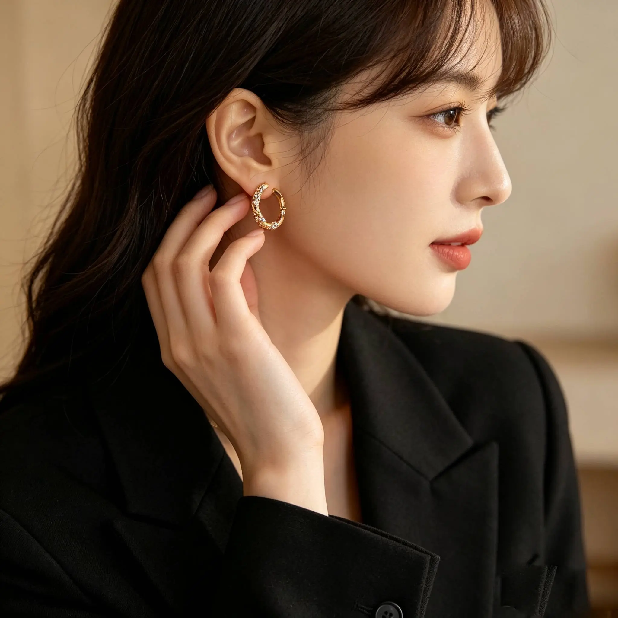Vintage textured gold hoop earrings with scattered rhinestones, understated luxury ear cuffs
