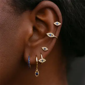 Golden CZ Devil's Eye Earring Set Huggies and Studs with Blue Stone Dainty Ear Stack for Multiple Piercings Protective Jewelry