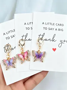 12pcs Cute Enamel Butterfly Keychain Set, Butterfly Charm Keychain, Thank You Theme Pocket Hug Gift Bag, Thank You Gift, Can Be Used For Coin Purse, Backpack And Car Key Accessories, Thanksgiving Gifts, Teacher's Day Gifts, Gift For Relatives And Friends