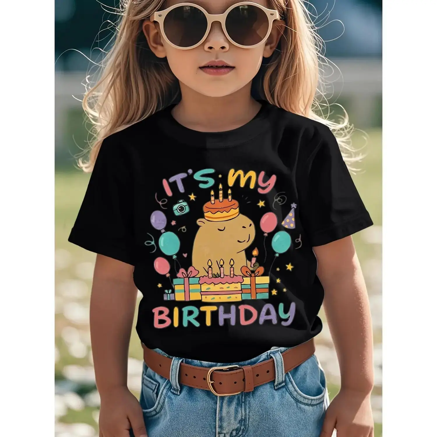 Cute Capybara Birthday Graphic T-Shirt for Girls Featuring Balloons and Confetti Fun Print Cotton T-Shirt