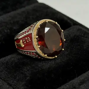 Vintage knight style, Ottoman exotic feel statement ring.Oval-cut red synthetic zircon ring, inlaid with red enamel, featuring an exotic knight style, daily tough-style jewelry, a fashionable accessory for men.