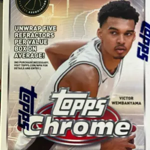 Ripped and shipped Topps Chrome Basketball Card - Unwrap Five Refractors Per Value Box on Average Featuring Victor Wembanyama