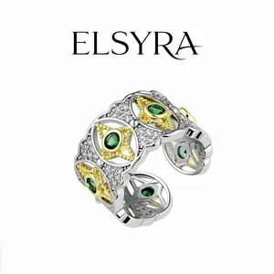 Elsyra S925 Sterling Silver Ring Star & Emerald Wide-Band Ring dual-tone silver golden color; embedded with green cubic zirconia & micro-pavé stones - Stunning Gift for Birthday, Anniversary & Holiday Celebrations | Bold Elegance for Statement Wear