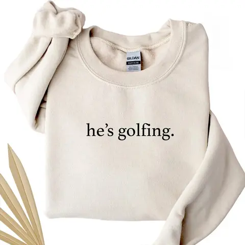 He’s Golfing Sweatshirt – Funny Golfer Wife Crewneck, Golf Season Pullover for Mom, Golf Lover Gift, Golf Player Sweater for Women