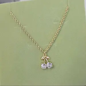 COLLAR DE CEREZA DORADA