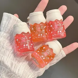 Set of 4 small milk bottle fruit-flavored lip glosses, moisturizing and hydrating lips, can be layered for a jelly-like lip effect, glossy and shiny, suitable for gifts and easy to carry.