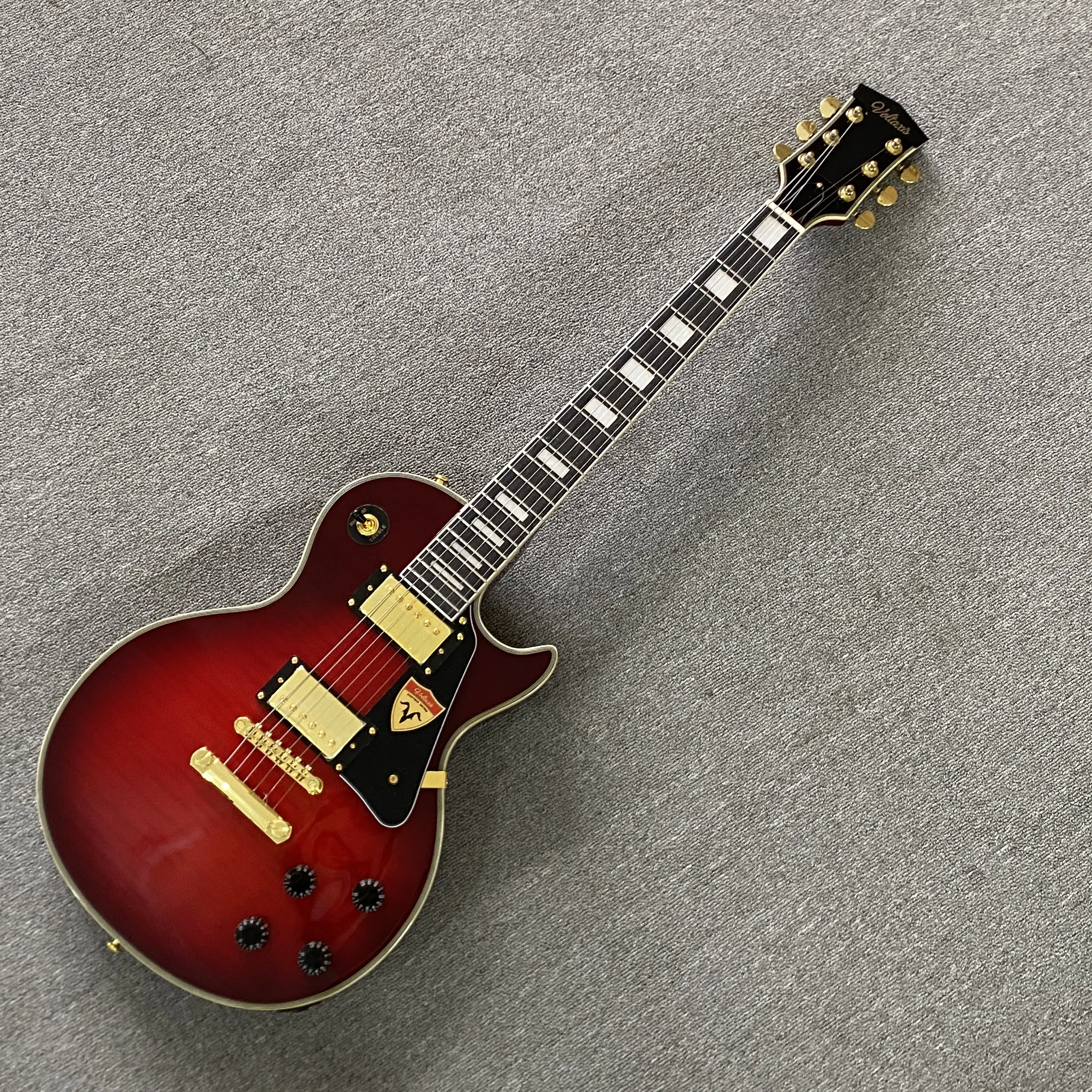 6-String Electric Guitar with Red Flame Maple Top, Mahogany Body, Rosewood Fingerboard, and Gold Hardware