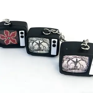 Stranger Things Mini Glowing TV Keychain with Dual Light Effects & Original Sound Interaction Mind Flayer Screen Pendant Eco-friendly PVC Metal Key Ring for Fans