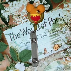Pooh bear badge reel