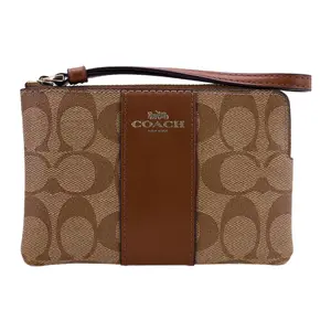 Coach Corner Zip 16 Wristlet with Monogram Canvas and Leather for Women in Brown