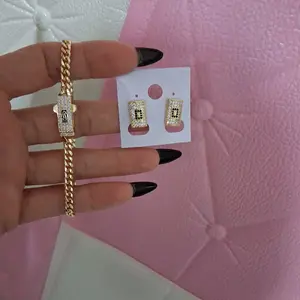 Elegant braceled and Earrings set ,7 inches ,box clasp ,14 k gokd laminated .