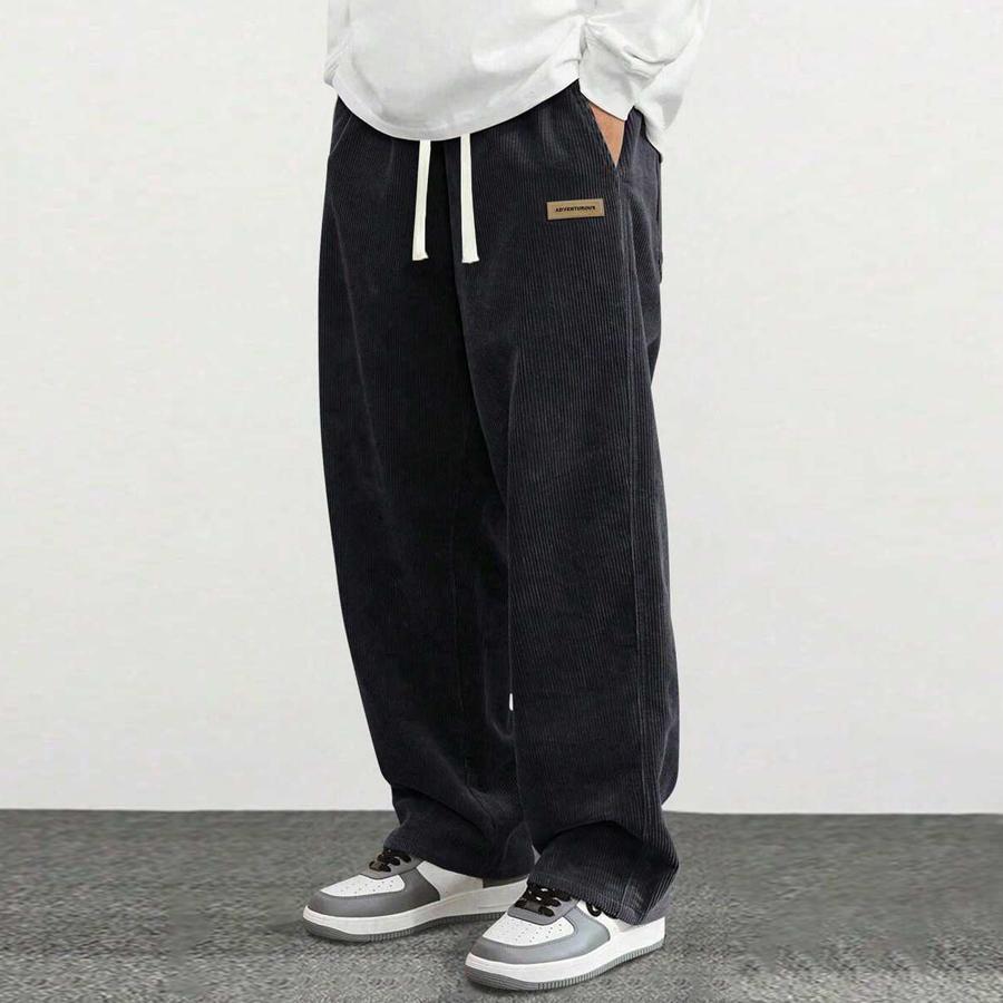 Men’s corduroy casual pants, loose straight fit, simple and versatile, suitable for spring and autumn wear.