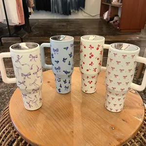 Spill Proof Insulated Tumbler with Handle, and leak proof lid.