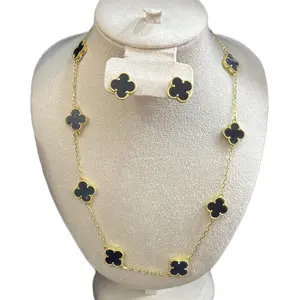 Set trébol color negro oro laminado