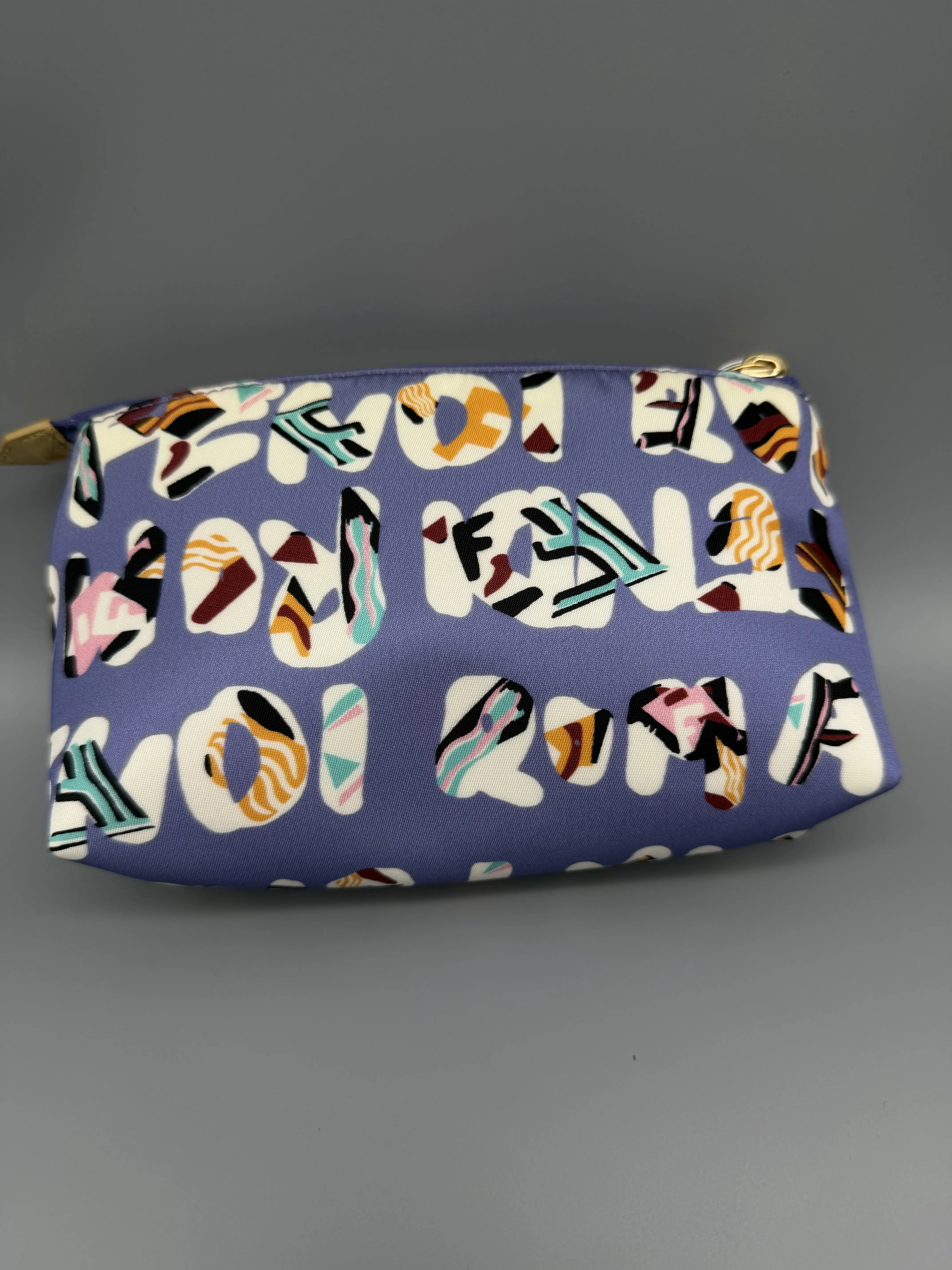 Pre-owned FENDI Nylon Small Leather Goods Typographic Cosmetic Pouch | Multicolor Logo Print Travel Case