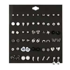 30 pairs of stud earrings with dark gray rose