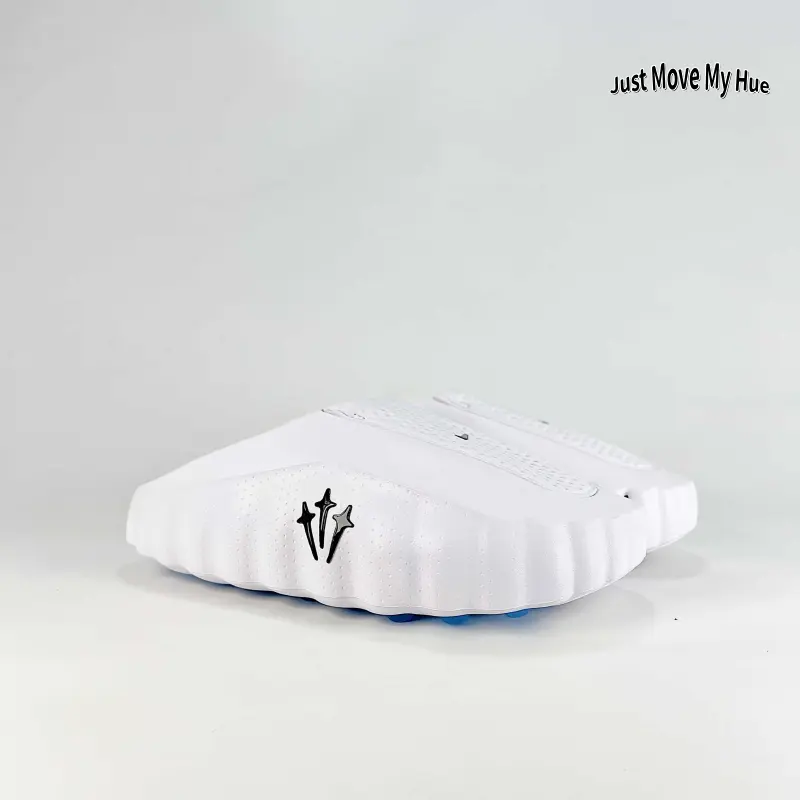 Streetwear slide mules carry fresh clean neutral minimalist casual vibe, combining soft breathable perforated molded EVA rubber and plush foam cushioned sole, solid bright white tone with side cutout vents & blue dot traction outsole