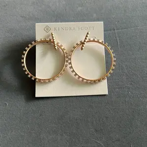 Kendra Scott golden hoop earrings