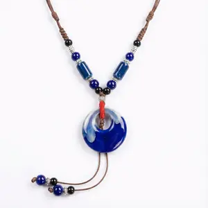 The Ocean’s Eye Ceramic Necklace Indigo Chakra Pendant Handmade Jingdezhen Pottery Amulet for Protection & Inner Peace Boho Spiritual Jewelry Gift for Women