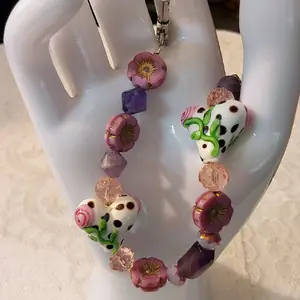 Handcrafted Beaded Bracelet with Floral and Heart Charms in Purple and Pink Colors
