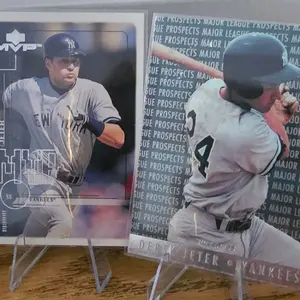 Upper Deck Sports Cards - Featuring Baseball Player in Gray Uniform with Number 4 & New York Yankees Logo