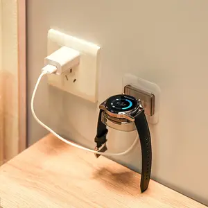 1count Wall-mounted smartwatch charging station with magnetic base and adjustable clamps – no drilling required, designed in black and gold, compatible with smartwatches,  – a space-saving organizer for bedrooms, smartwatch charging station.