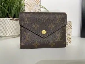 Pre-owned Louis Vuitton wallet wallet monogram Victorine compact wallet