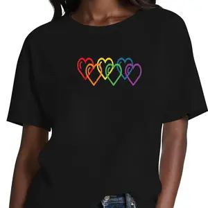 Loose-fitting cotton t-shirt with rainbow hearts for LGBTQ Pride Month. Round neck, short sleeves, black, unisex style. Casual and festive clothing. Lightweight heart design. Ideal for celebrations and events. Breathable Fabric Print rainbow  outfits