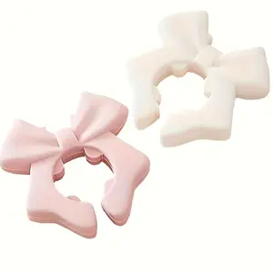 A silicone spoon and spatula holder, Kitchenware, with heat resistance and anti-slip properties, featuring a semi-arch shape design, saves space and organizes utensils on the countertop