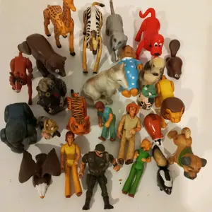 25 Cartoon and Movie Characters Action Figures. Even a Skunk is there - A Collector's Items