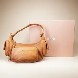 Pre-owned miumiu leather Shoulder Bags Nappa Pocket Brown Shoulder Bag